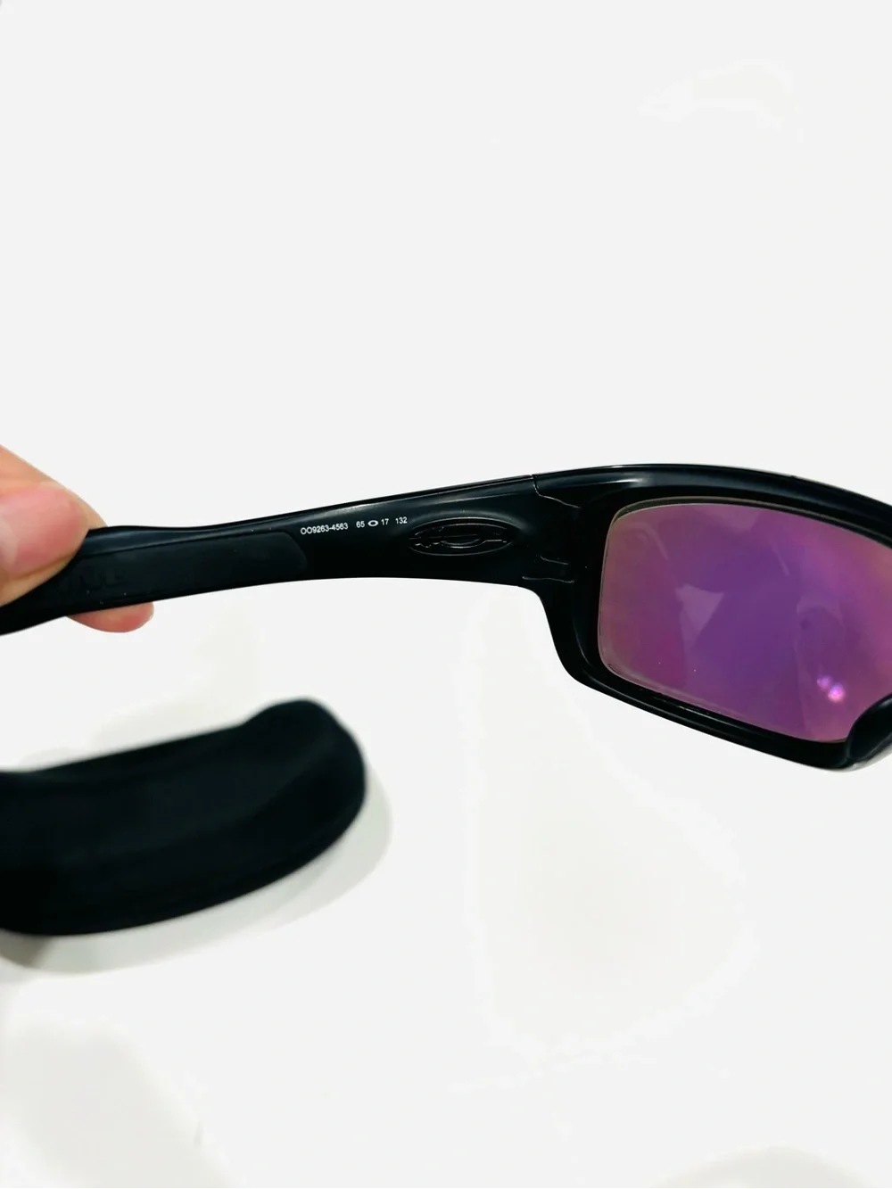 Oakley Black Frame Sunglasses with Green-Blue Mirrored Lenses